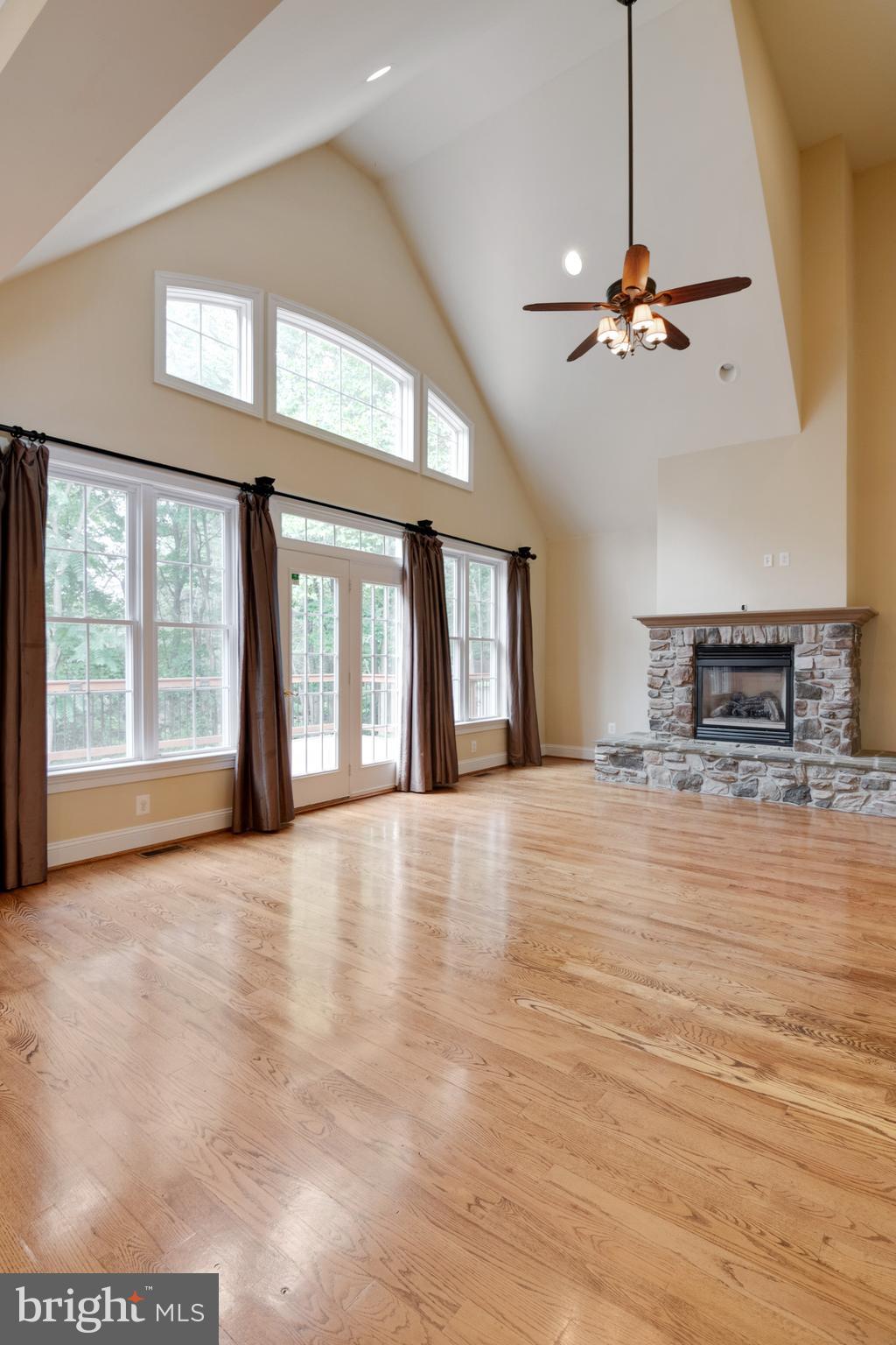 11504 Gambrill Park Road Frederick, MD 21702 - Photo 26 of 67 Great room with natural light and gas fireplace