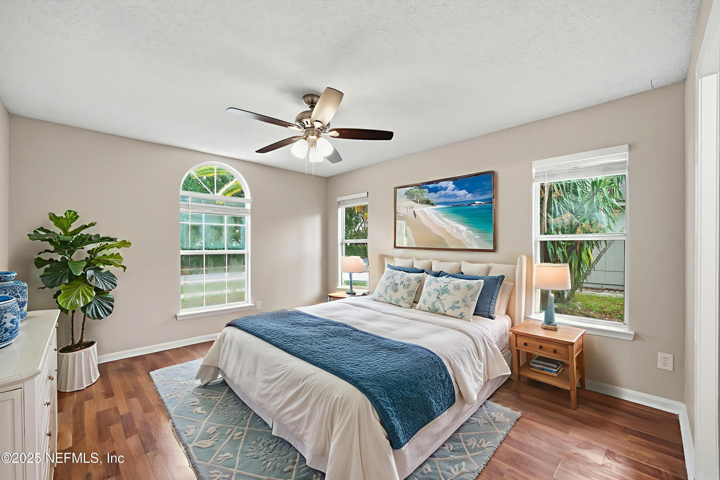 905 Gavagan Road Jacksonville, FL 32233 - Photo 11 of 21 a bedroom with a large bed and a window