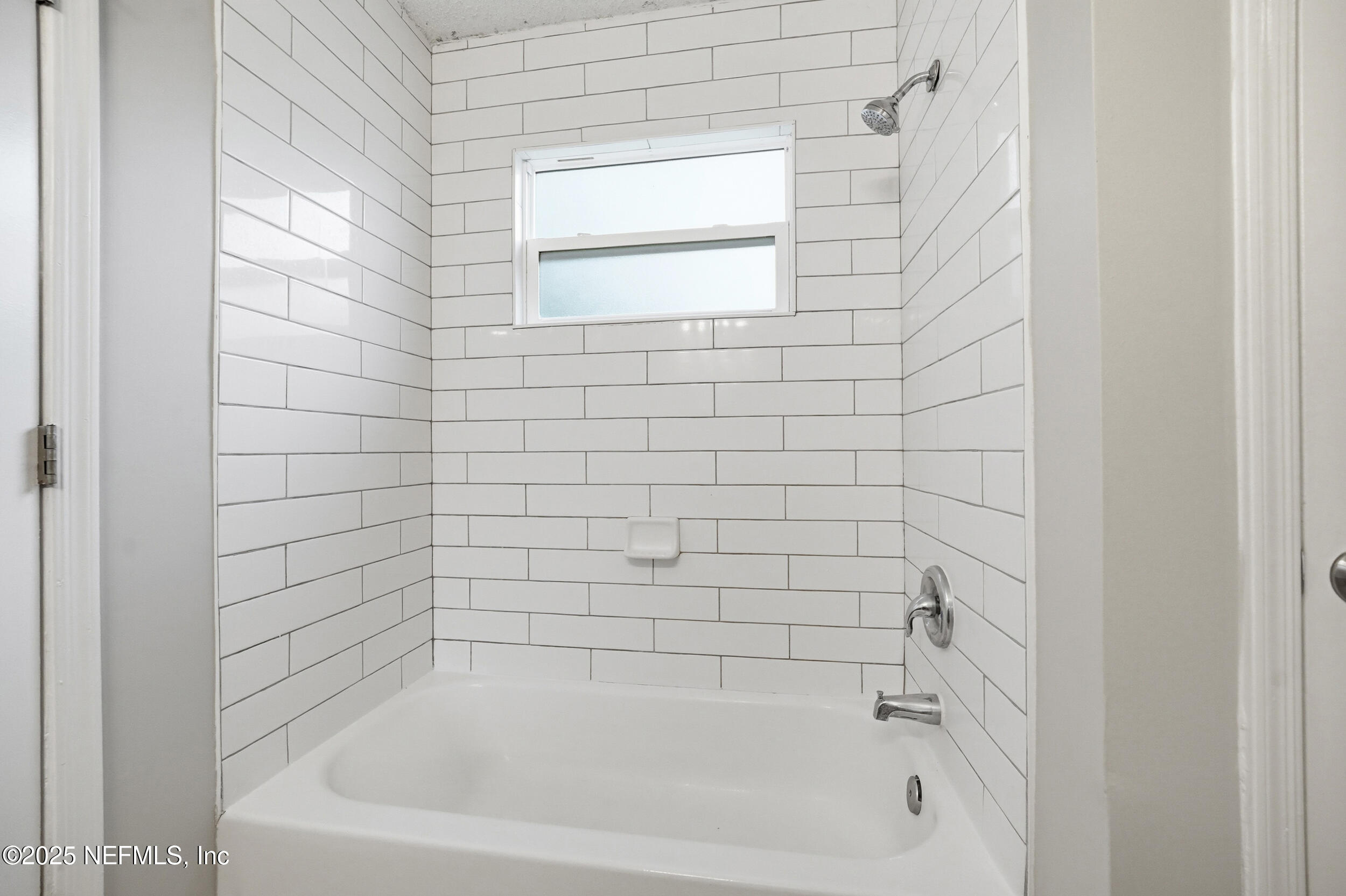 905 Gavagan Road Jacksonville, FL 32233 - Photo 13 of 21 a close up of a bathtub curtain