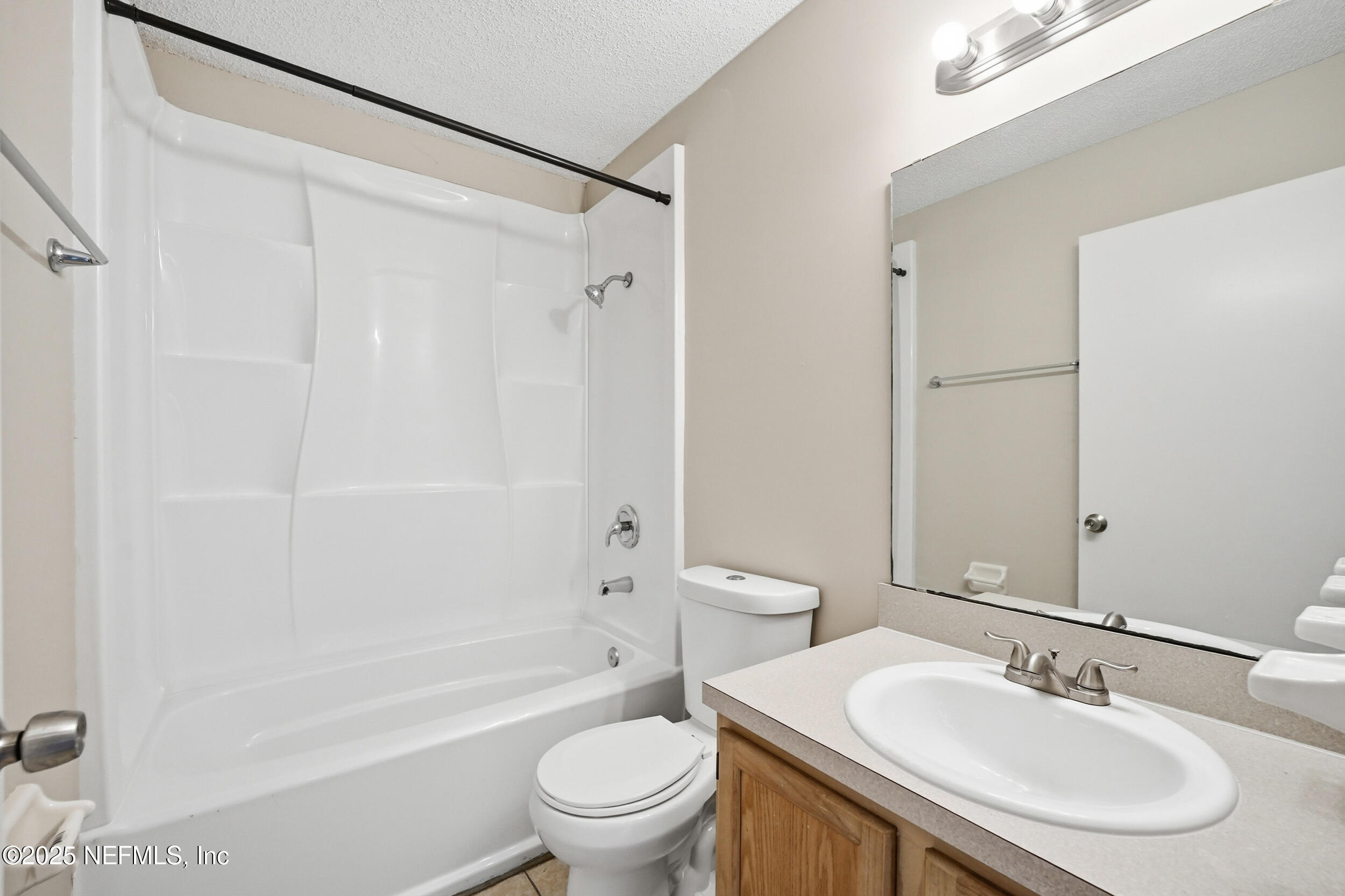 905 Gavagan Road Jacksonville, FL 32233 - Photo 17 of 21 a bathroom with a sink toilet and shower