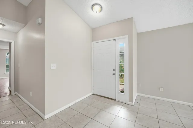 a picture of a cabinet with a white wall