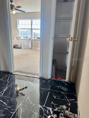 a view of a large pool with an ocean view