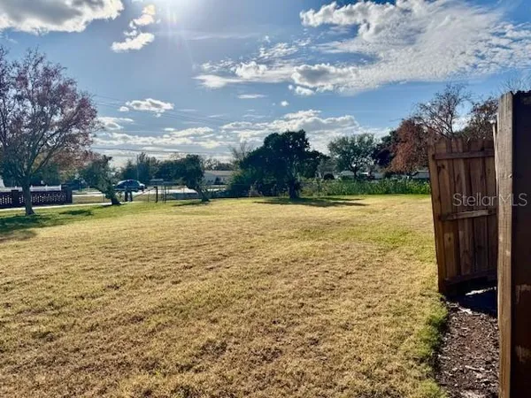 a backyard of a house with seating space