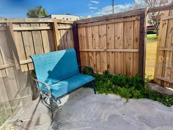 a view of a back yard of the house