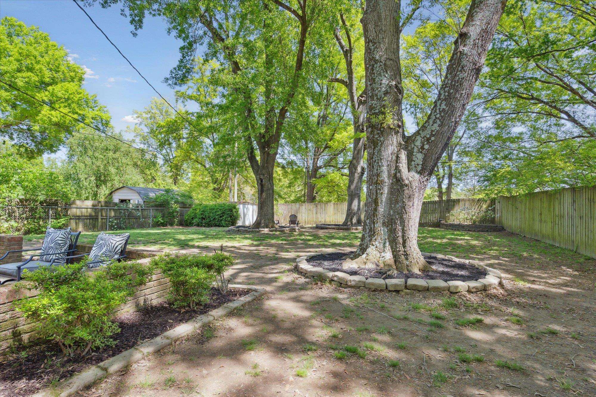 336 McElroy Road Memphis, TN 38120 - Photo 20 of 26 View of yard featuring a patio area