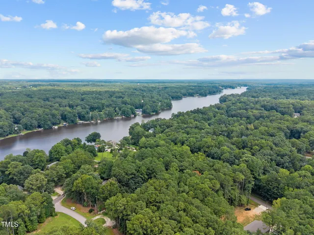 a view of a lake with a city