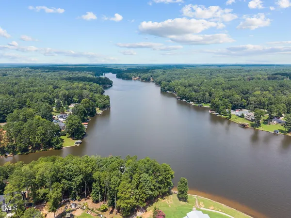 a view of a lake with a city