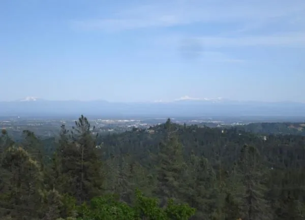 a view of city and mountain