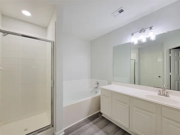 a bathroom with a sink and a bathtub