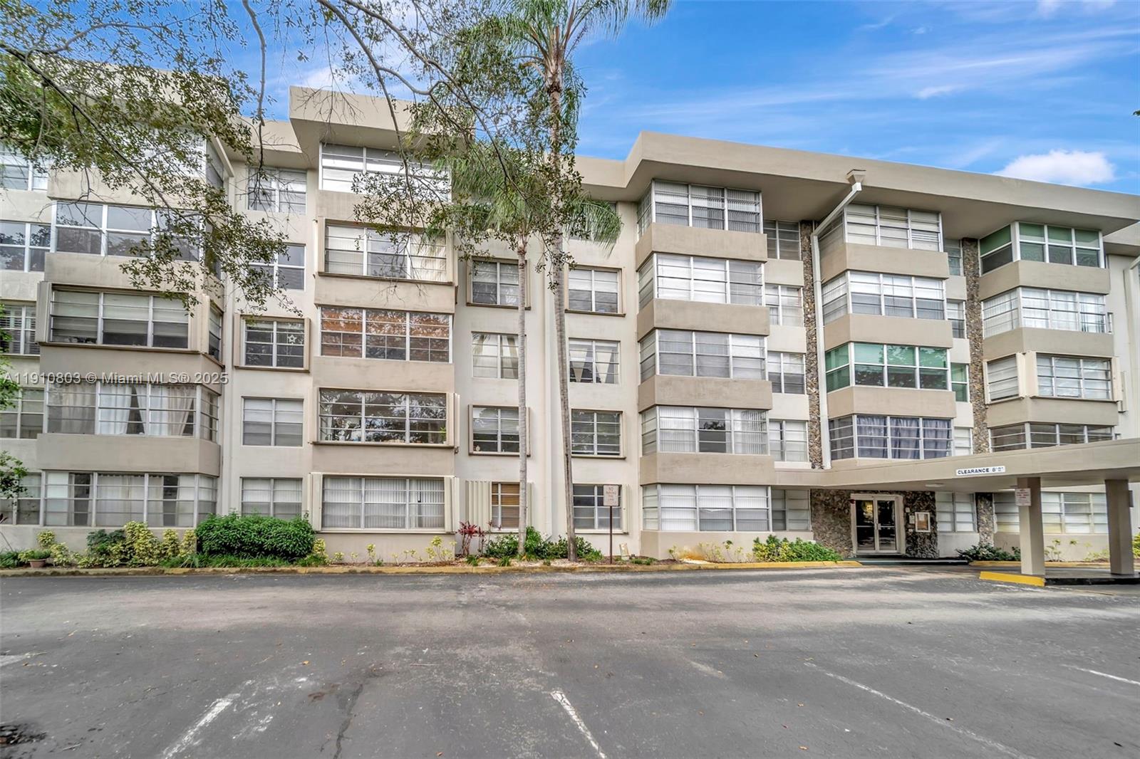 6700 Cypress Road, Unit 105 Plantation, FL 33317 - Photo 2 of 28 a front view of a building with street view
