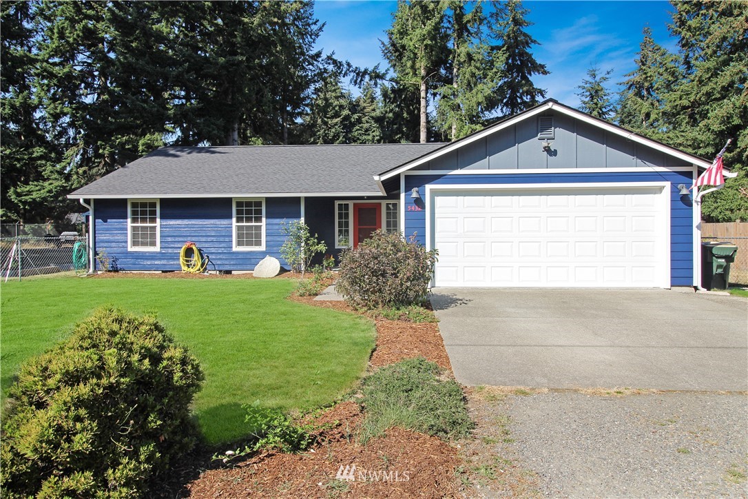 5432 188th Avenue Southwest Rochester, WA 98579 - Photo 1 of 31 a view of a house with a yard patio and a garden