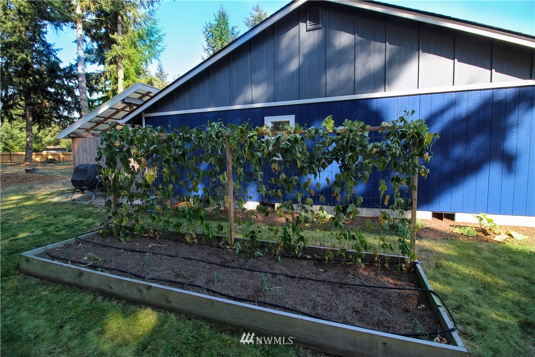 5432 188th Avenue Southwest Rochester, WA 98579 - Photo 29 of 31 a backyard of a house with lots of green space
