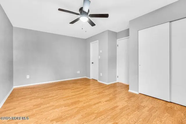 a view of a big room with carpet