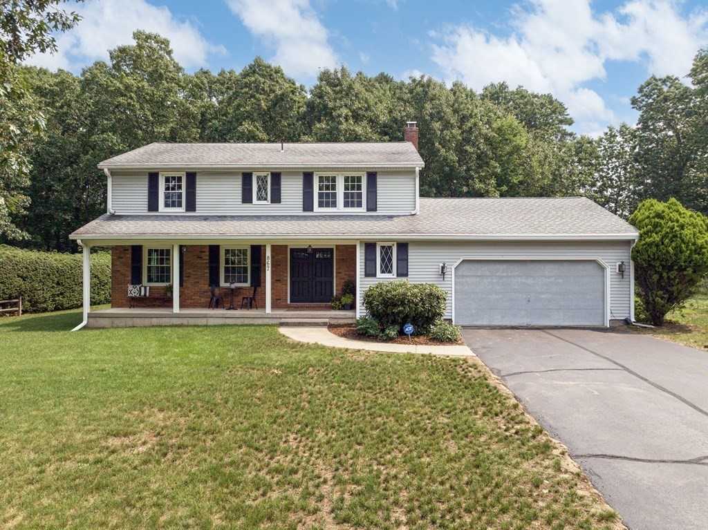 867 Shaker Road Longmeadow, MA 01106 - Photo 1 of 34 front view of a house with a yard