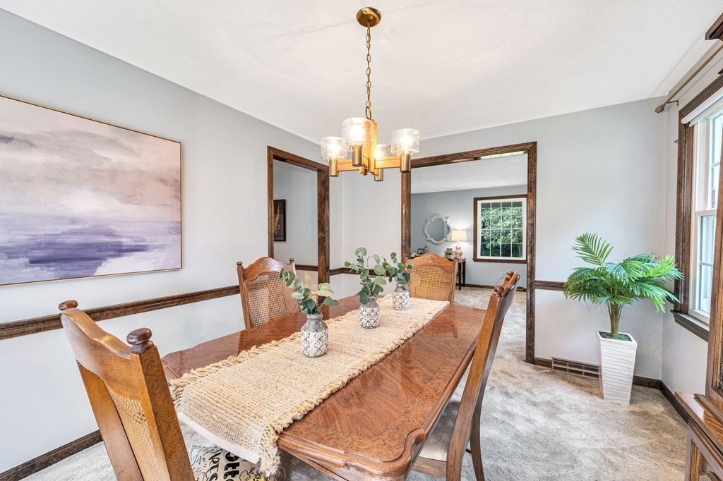 867 Shaker Road Longmeadow, MA 01106 - Photo 11 of 34 a view of a dining room with furniture window and wooden floor