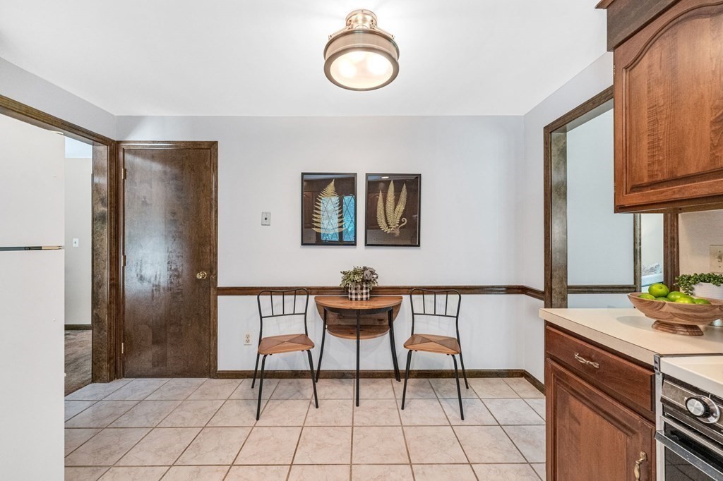867 Shaker Road Longmeadow, MA 01106 - Photo 15 of 34 a view of a dining room with furniture