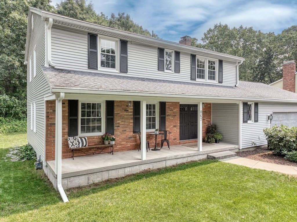 867 Shaker Road Longmeadow, MA 01106 - Photo 2 of 34 front view of a house with a yard