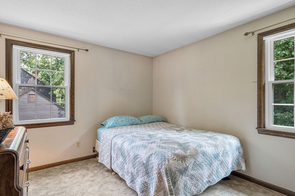 867 Shaker Road Longmeadow, MA 01106 - Photo 26 of 34 a bedroom with a bed and a window
