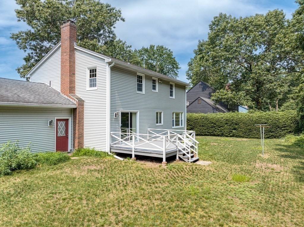 867 Shaker Road Longmeadow, MA 01106 - Photo 33 of 34 a front view of a house with garden