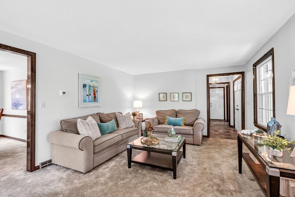 867 Shaker Road Longmeadow, MA 01106 - Photo 6 of 34 a living room with furniture and a large window