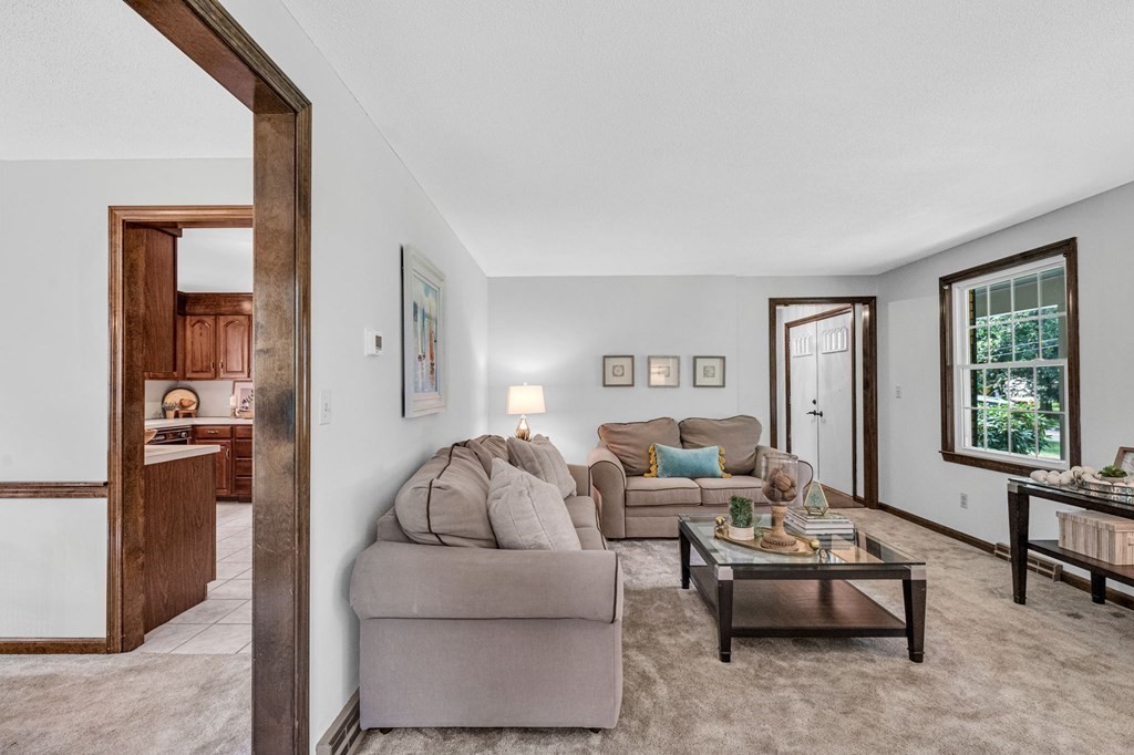 867 Shaker Road Longmeadow, MA 01106 - Photo 7 of 34 a living room with furniture and a window