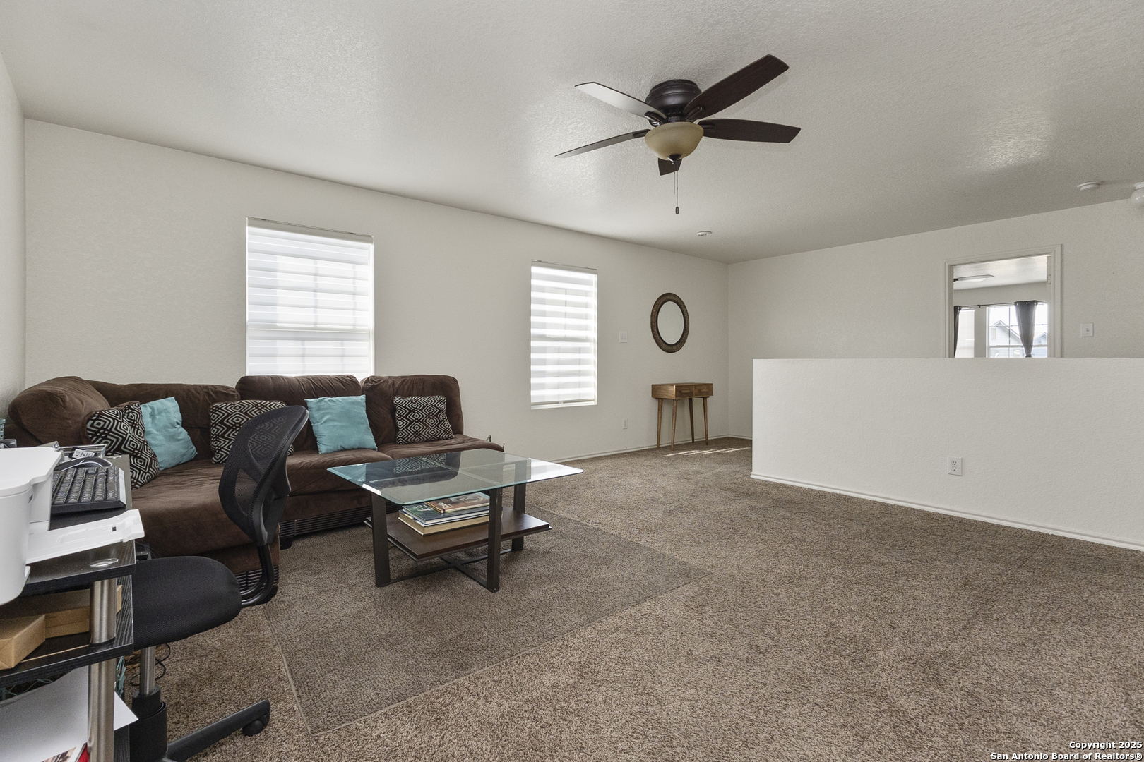707 Ridingate Farm San Antonio, TX 78228 - Photo 13 of 30 a living room with furniture and a window