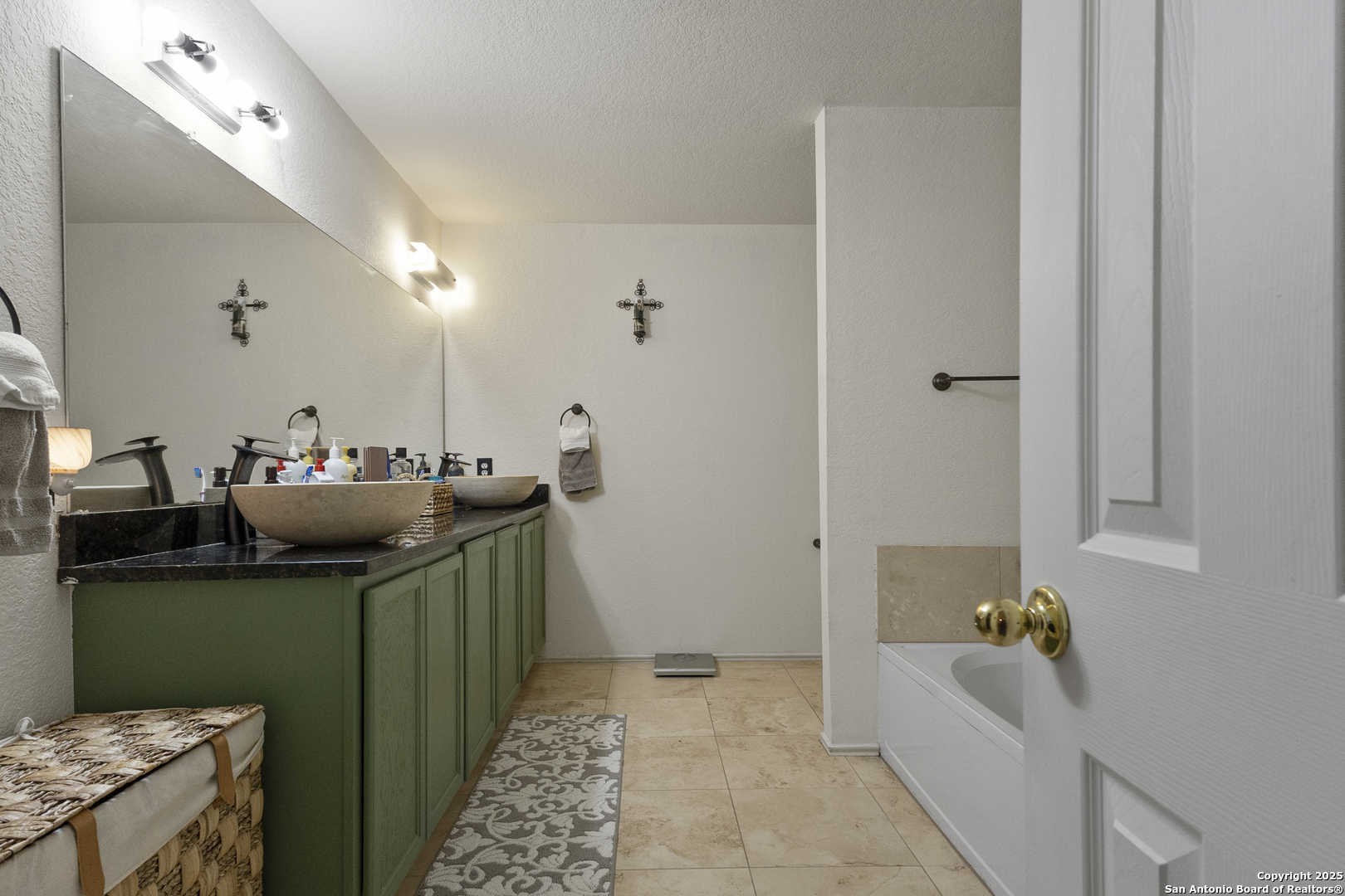 707 Ridingate Farm San Antonio, TX 78228 - Photo 24 of 30 a bathroom with a sink and toilet