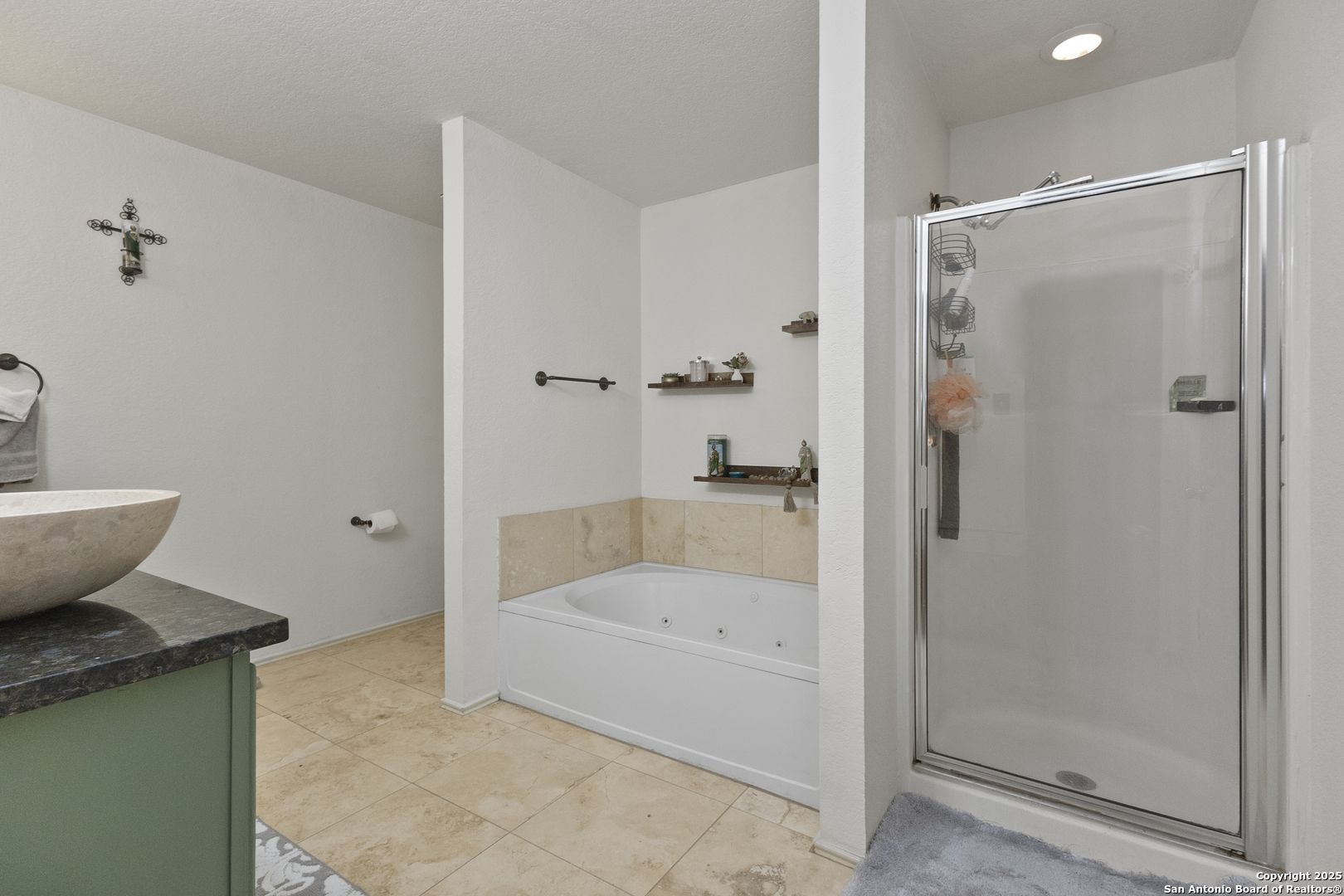 707 Ridingate Farm San Antonio, TX 78228 - Photo 27 of 30 a bathroom with a granite countertop bathtub shower and toilet