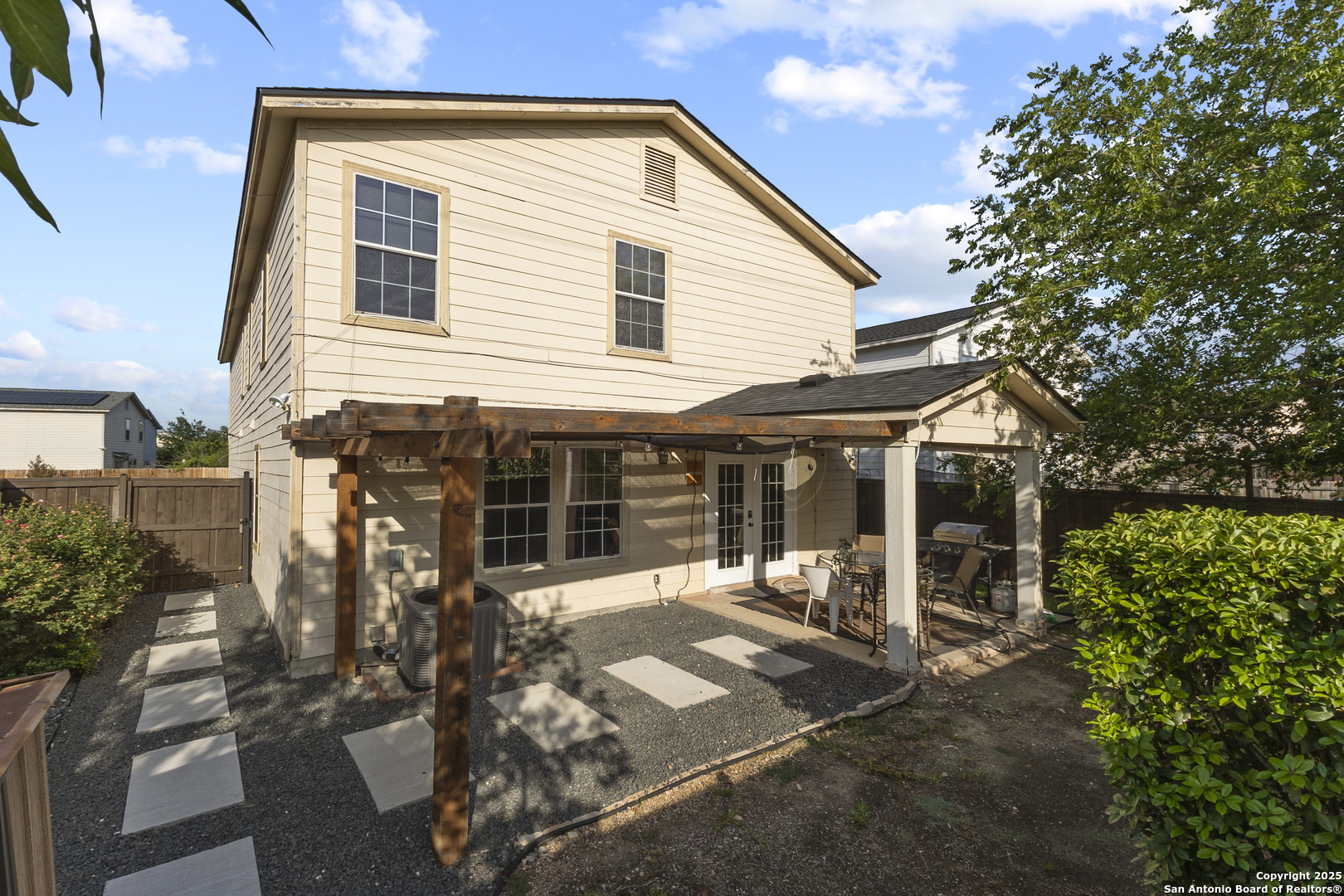 707 Ridingate Farm San Antonio, TX 78228 - Photo 28 of 30 a front view of a house with a yard