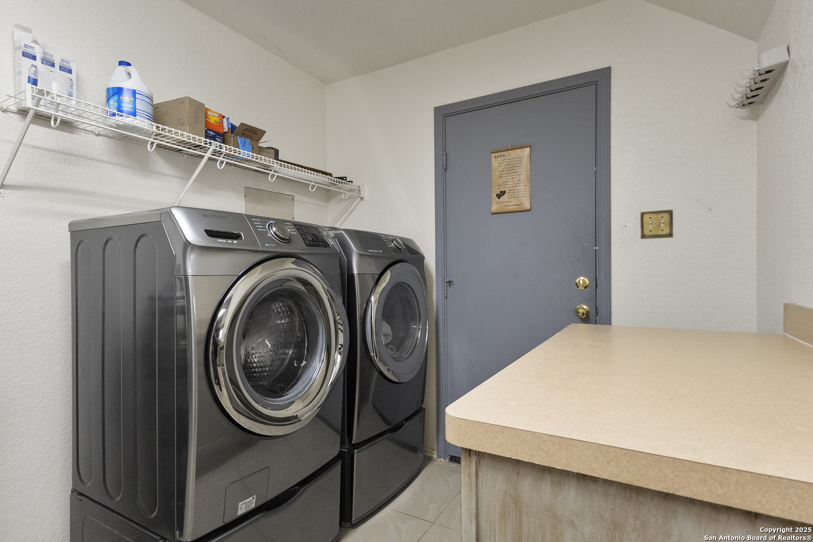 707 Ridingate Farm San Antonio, TX 78228 - Photo 7 of 30 a utility room with dryer and washer