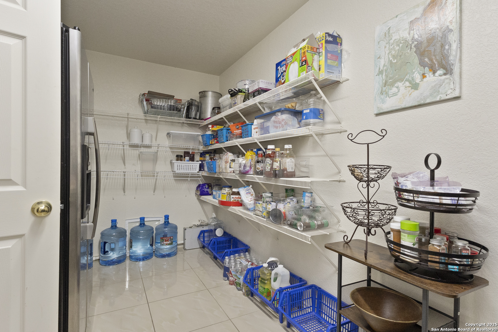 707 Ridingate Farm San Antonio, TX 78228 - Photo 8 of 30 a room with lots of bottles of alcohol