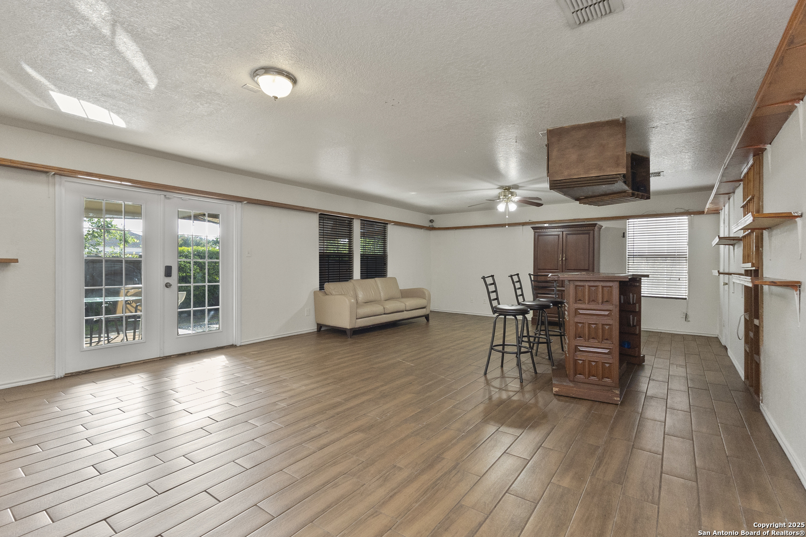 707 Ridingate Farm San Antonio, TX 78228 - Photo 9 of 30 a view of a livingroom with furniture and a flat screen tv