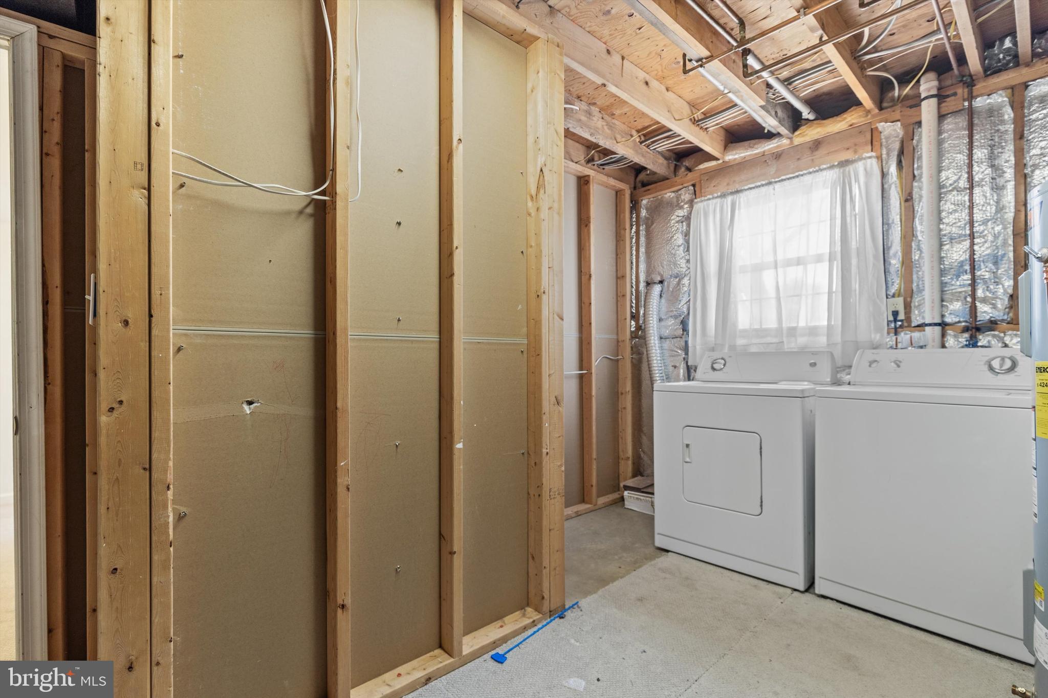 6733 Killdeer Court Frederick, MD 21703 - Photo 26 of 33 Lower Level Storage, Utility & Laundry