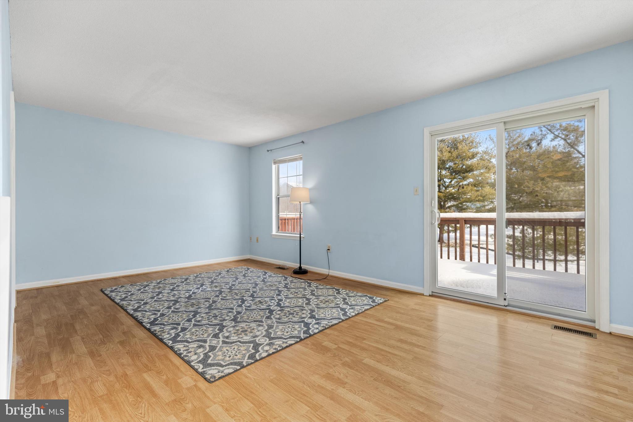 6733 Killdeer Court Frederick, MD 21703 - Photo 10 of 33 Main level LR with access to rear deck!