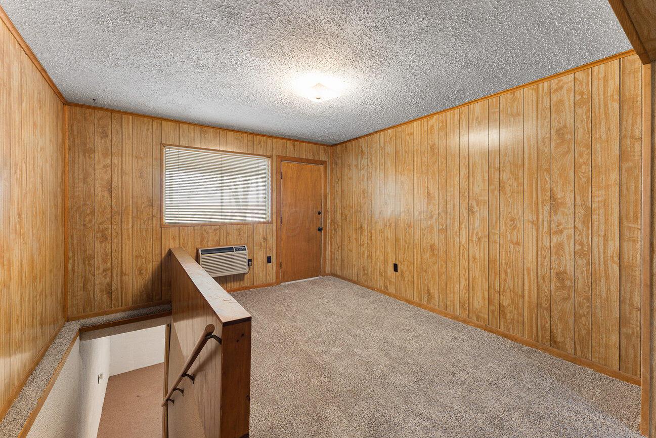 1133 Elmore Street Borger, TX 79007 - Photo 22 of 43 a view of an empty room with a window
