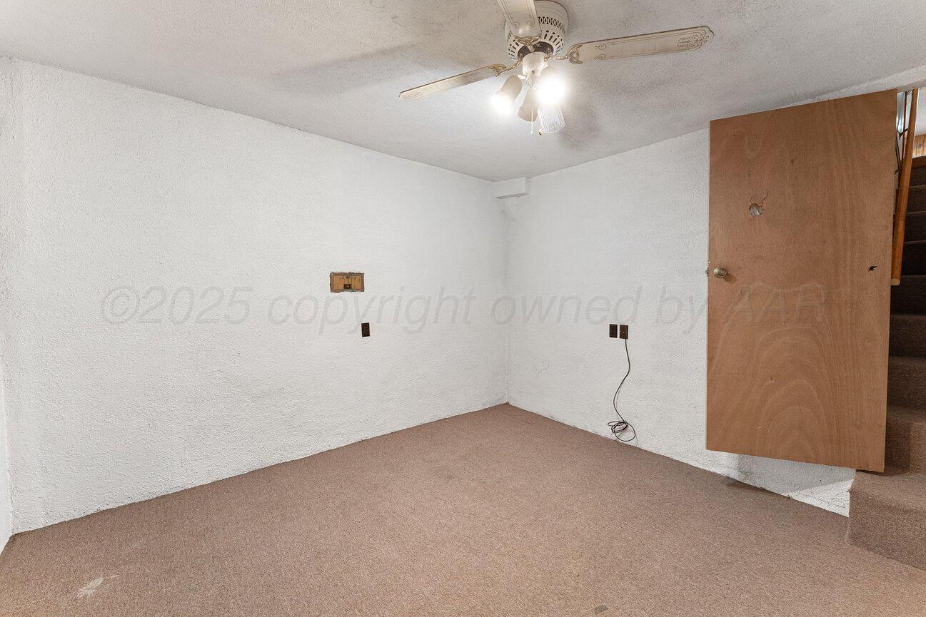 1133 Elmore Street Borger, TX 79007 - Photo 25 of 43 wooden floor in an empty room