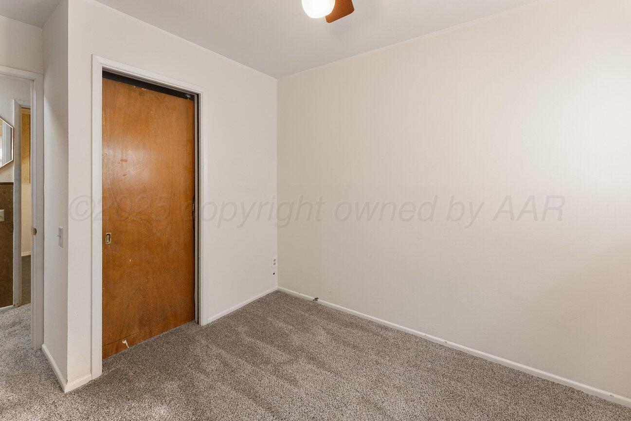 1133 Elmore Street Borger, TX 79007 - Photo 31 of 43 an empty room with windows