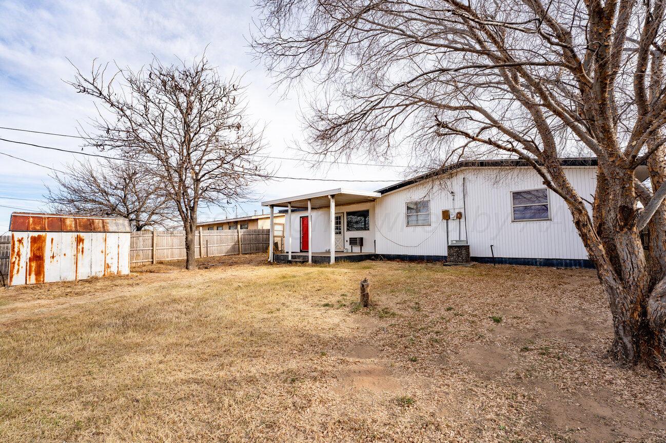 1133 Elmore Street Borger, TX 79007 - Photo 39 of 43 a front view of a house with a yard covered in snow