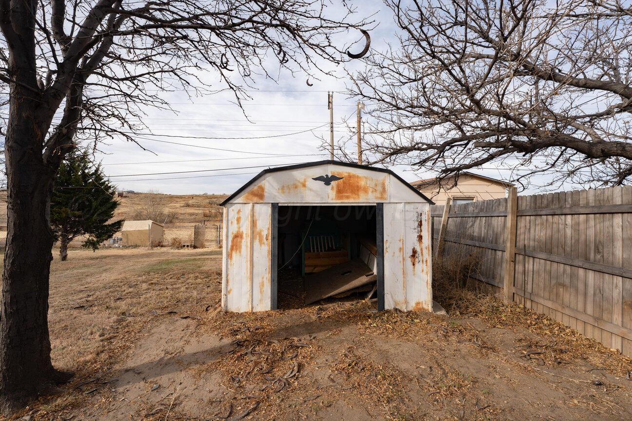 1133 Elmore Street Borger, TX 79007 - Photo 43 of 43 a view of entrance gate of a house