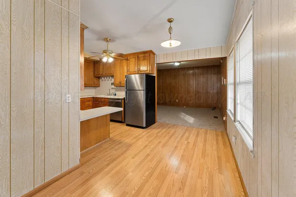 a view of a kitchen from the hallway
