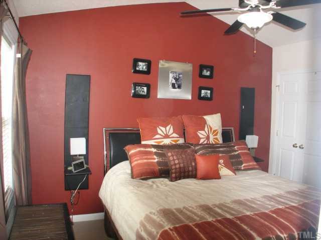4833 Windbreak Lane Raleigh, NC 27616 - Photo 2 of 5 a bedroom with bed and window