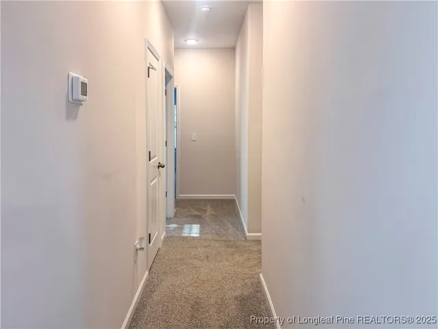 a bathroom with a sink double vanity and a mirror