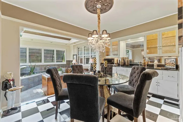 a view of walk in closet and bedroom