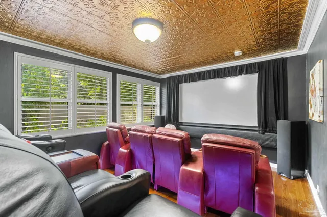 a bed room with a bed and a chair