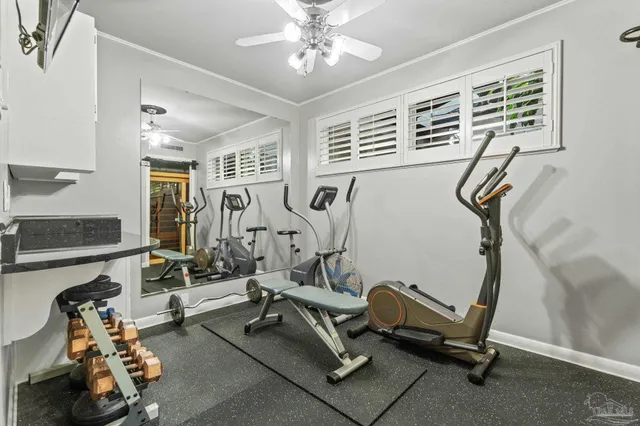 swimming pool view with a seating space
