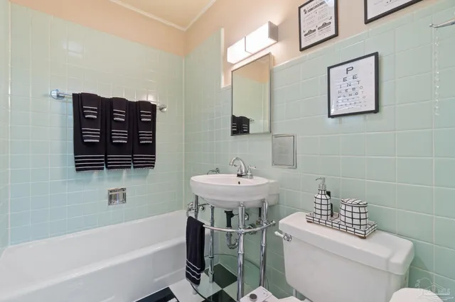 an aerial view of residential house with outdoor space and street view