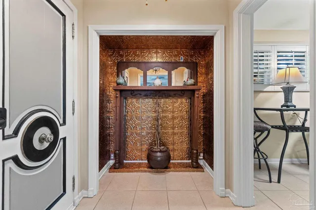 an aerial view of a house having swimming pool patio and a yard