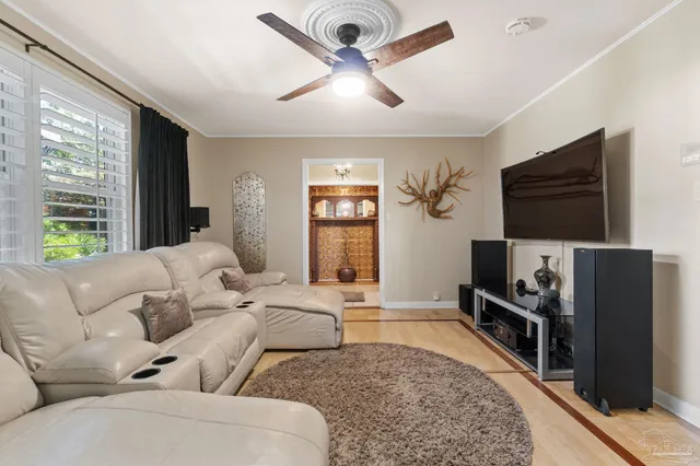 a view of a backyard with swimming pool