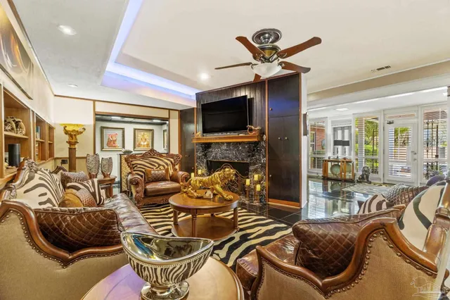 a bathroom with a toilet a sink and a large mirror