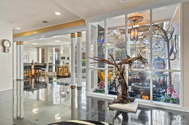 a kitchen with granite countertop a sink and a stove